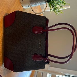Genuine Michael Kors bag. Dark brown with dark red.